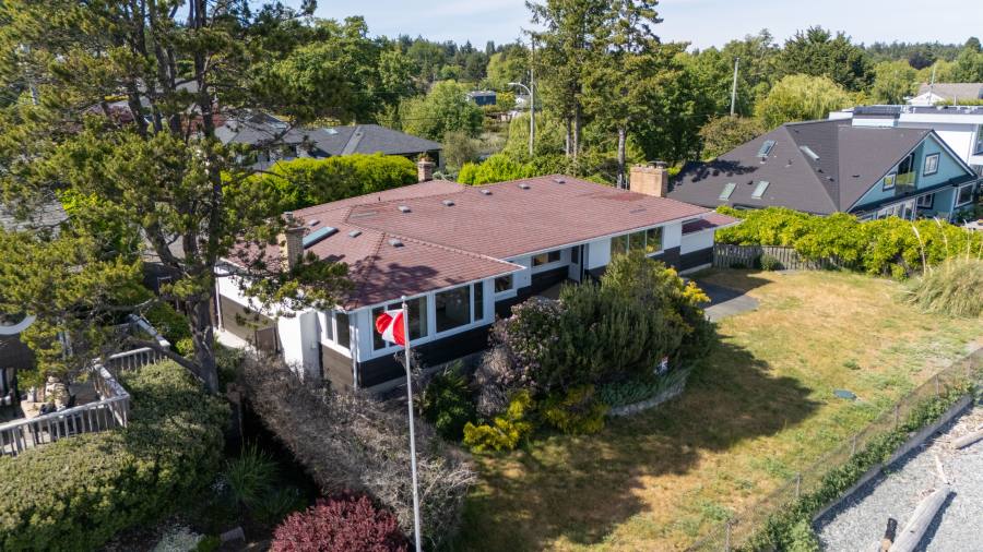 Aerial over the low-bank waterfront lot